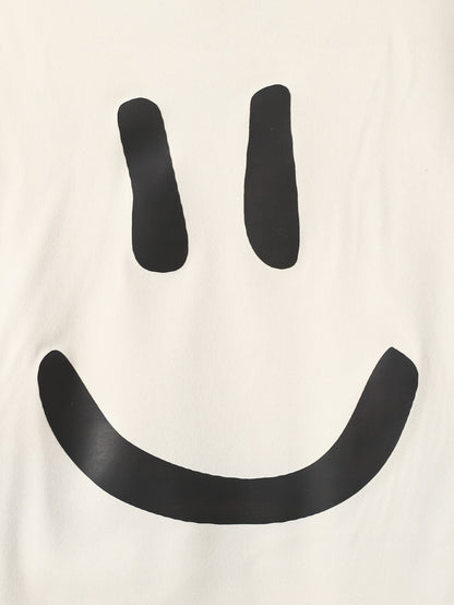 2 peças Jogo de camisa de manga curta e short estampado de cor sólida casual para meninos jovens com estampa de rosto sorridente, adequado para o verão, lazer, festas, uso diário, escola, viagens, encontros