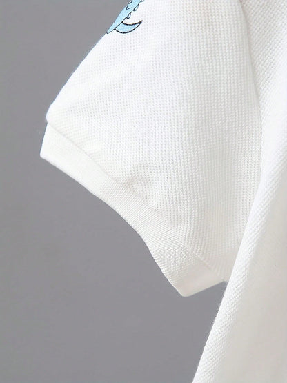 Conjunto de 2 peças de roupas casuais com Top polo de manga curta com estampa de dinossauro e calça curta sólida para meninos, na moda.